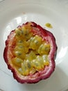 A closeup pic of a tasty passion fruit or maracuja fruit ready to be eaten