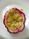 A closeup pic of a tasty passion fruit or maracuja fruit ready to be eaten