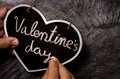 Hand writing Valentine day in chalkboard Royalty Free Stock Photo