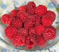 A handful of red raspberry.