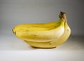 Closeup picture of a ripe banana pack on the isolated white backgr