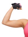 Sporty woman flexing her biceps