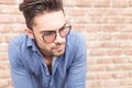 Closeup picture of a young casual man with glasses Royalty Free Stock Photo