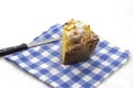Closeup of a piece of apple pie on a napkin isolated on a white background Royalty Free Stock Photo