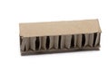 Closeup piece brown corrugated cardboard white background