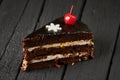 Closeup of a piece of carrot cake on a plate with short depth of field. Cake slice on a plate, with whole cake in the Royalty Free Stock Photo