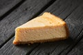 Closeup of a piece of carrot cake on a plate with short depth of field. Cake slice on a plate, with whole cake in the Royalty Free Stock Photo