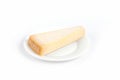 Closeup of a piece of parmesan cheese on a plate isolated on a white background Royalty Free Stock Photo