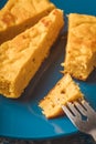 Closeup of a piece of pumpkin pie on a fork