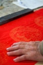 Closeup of a piece of red paper used to write Chinese New Year couplets Royalty Free Stock Photo