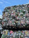 Closeup of a pile of cans under the blue sky