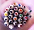 Closeup of a pile of colour pencils. Macro shot of a collection of pencil crayons for arts, crafts and creative use