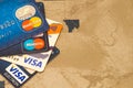 Closeup pile of credit cards, Visa and MasterCard