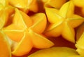 Closeup of Pile of Fresh Ripe Vibrant Yellow Star Fruits