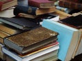 Closeup of the pile of old books stacked on top of each other Royalty Free Stock Photo