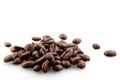 Closeup of a pile of roasted coffee beans isolated on a white background Royalty Free Stock Photo