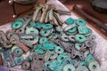 A closeup of a pile of rusty ancient Chinese coins