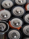 Closeup of pile of used alkaline batteries. Close up colorful rows of selection of AA batteries energy abstract Royalty Free Stock Photo