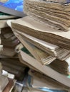 Close-up of piles of worn-out old books at the bookstore