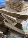 Close-up of piles of worn-out old books at the bookstore Royalty Free Stock Photo