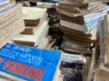 Stacks of worn-out books for sale at a used book fair in Vietnam, May 2022 Royalty Free Stock Photo