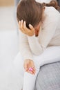 Closeup on pills in hand of stressed young woman Royalty Free Stock Photo