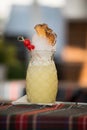 pinacolada cocktail on a shaped pineapple glass in the retaurant terrace