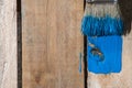 Closeup Of Pine Plank Being Painted In Blue Color Royalty Free Stock Photo
