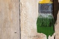 Closeup Of Pine Plank Being Painted In Green Color Royalty Free Stock Photo