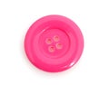 Closeup of pink clothing button
