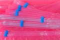 Pink plastic zip lock bag with blue sealing to pack store cloths