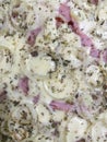 Closeup pizza with ham, cheese mozzarella, onion and oregano. Pizza texture. Pizza background.