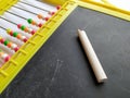 Plastic Colorful Beeds for Abacus , Black Board Slate with Chalk Piece on white background