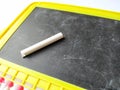 Plastic Colorful Beeds for Abacus , Black Board Slate with Chalk Piece on white background