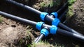 Closeup of plastic pipes of plant watering system in gardens