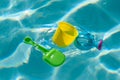 plastic toys floating in swimming pool Royalty Free Stock Photo