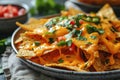 closeup of a plate of delicious crispy nachos chips with cheese