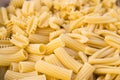 Closeup of a plate full of various types of short italian pasta Royalty Free Stock Photo