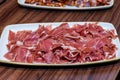 closeup of a plate with spanish serrano ham Royalty Free Stock Photo