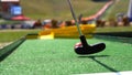 Closeup of player play mini golf Royalty Free Stock Photo