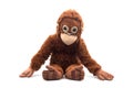 Plush monkey sitting on white background