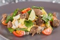 Closeup poke with beef and rice and vegetables. Hawaiian cuisine.