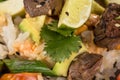 Closeup poke with beef and rice and vegetables. Hawaiian cuisine.