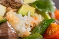 Closeup poke with beef and rice and vegetables. Hawaiian cuisine.