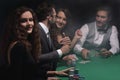 Closeup.poker players sitting at a casino table Royalty Free Stock Photo