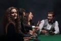 Closeup.poker players sitting at a casino table Royalty Free Stock Photo