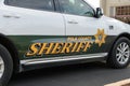 Closeup of Polk County sheriff vehicle with name and badge