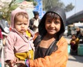 Closeup of poor boy with a baby new delhi india