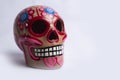 Closeup of a popular clay skull for the day of the dead offering Royalty Free Stock Photo