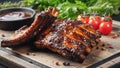 Closeup of pork ribs grilled with BBQ sauce and caramelized in honey. Tasty snack to beer on a wooden Board for filing on dark Royalty Free Stock Photo